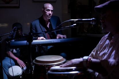 A group of musicians during a performance at Mi Salsa Kitchen.