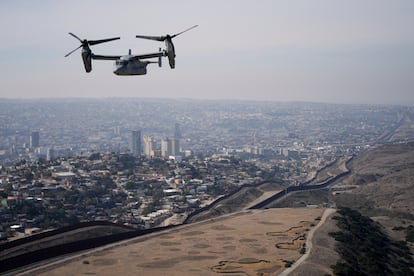 A U.S. Navy plane flies over the U.S.-Mexico border, Friday, Jan. 31, 2025, near San Diego.