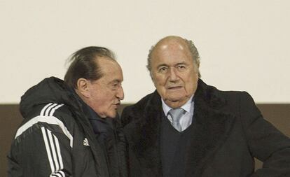 Blatter jnto a Figueredo en 2014.