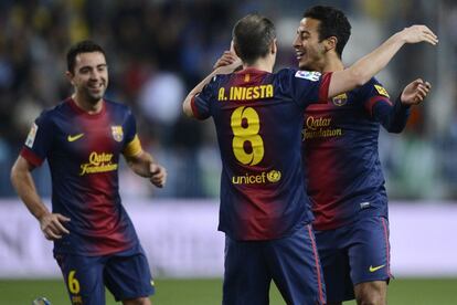 Thiago Alcantara celebra con Andres Iniesta su gol, el 1 a 3.