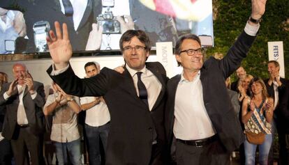 El president de la Generalitat, Carles Puigdemont, i Artur Mas, ahir a Girona.