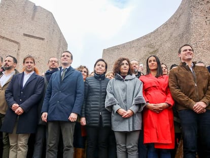 Abascal (3rd from left), Casado (c) and Rivera (r) pose for a photo after the demonstration.