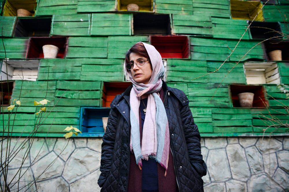 TEHRAN, IRAN - DECEMBER 9, 2014: Human rights lawyer Nasrin Sotoudeh photographed in the garden of her office on December 9, 2014 in Tehran, Iran. Nasrin Sotoudeh is a human rights lawyer who has represented imprisoned Iranian opposition activists and politicians following the disputed June 2009 Iranian presidential elections as well as prisoners sentenced to death for crimes committed when they were minors. Sotoudeh was arrested in September 2010 on charges of spreading propaganda and conspiring to harm state security and was imprisoned in solitary confinement in Evin Prison. In January 2011, Iranian authorities sentenced Sotoudeh to 11 years in prison, in addition to barring her from practicing law and from leaving the country for 20 years. An appeals court later reduced Sotoudeh's prison sentence to six years, and her ban from working as a lawyer to ten years. On 26 October 2012, Sotoudeh was announced as a co-winner of the Sakharov Prize of the European Parliament. She shared the award with Iranian film director Jafar Panahi. Sotoudeh was released on 18 September 2013 along with ten other political prisoners, including opposition leader Mohsen Aminzadeh, days before an address by Iranian President Hassan Rouhani to the United Nations. No explanation was given for her early release. (Photo by Kaveh Kazemi/Getty Images)