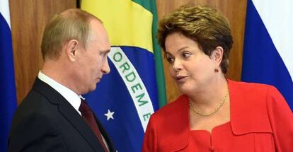 Putin with Brazilian president Dilma Rousseff.