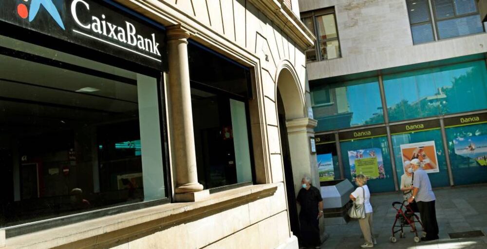 Los accionistas dan luz verde a la fusión de CaixaBank y Bankia, que ...