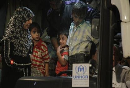 Refugiados sirios llegan al campo de Zaatari, en Jordania. 