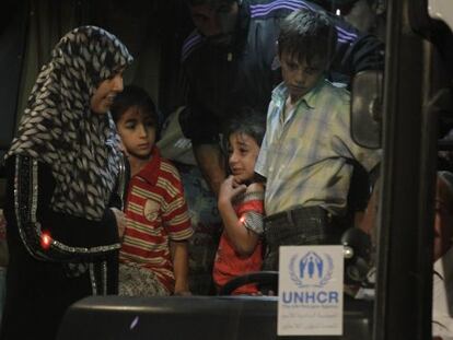 Refugiados sirios llegan al campo de Zaatari, en Jordania.