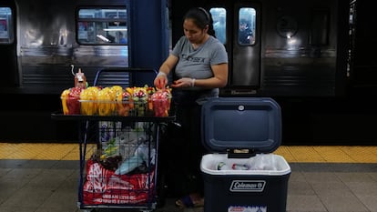 NEW YORK, NEW YORK - AUGUST 18: A woman sells candy and other items in a New York City subway station on August 18, 2023 in New York City. Over 70,000 asylum-seekers have arrived in New York City since last year, according to City Hall, and many have taken to selling items on the streets and subways of the city. Children and young adults selling candy, snacks and drinks in subway stations and cars are an increasingly common site in New York as families look to make ends meet financially as many do not have work permits. (Photo by Spencer Platt/Getty Images)