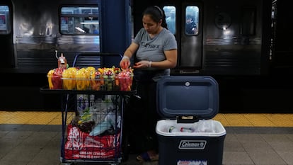 NEW YORK, NEW YORK - AUGUST 18: A woman sells candy and other items in a New York City subway station on August 18, 2023 in New York City. Over 70,000 asylum-seekers have arrived in New York City since last year, according to City Hall, and many have taken to selling items on the streets and subways of the city. Children and young adults selling candy, snacks and drinks in subway stations and cars are an increasingly common site in New York as families look to make ends meet financially as many do not have work permits.  (Photo by Spencer Platt/Getty Images)