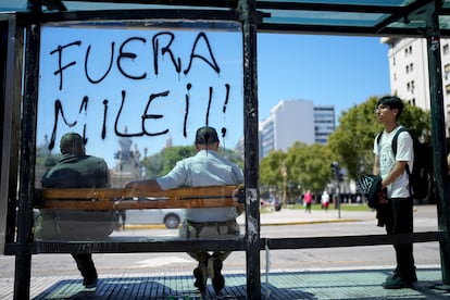 Anti-Milei graffiti painted on a bus shelter in Buenos Aires, March 7, 2024. 