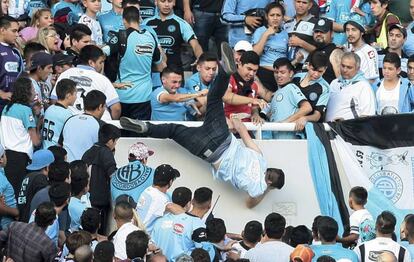 Emanuel Balbo is pushed from the stand.