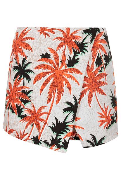 Falda-pantalón de palmeras en tonos naranjas de Topshop (44 euros).
