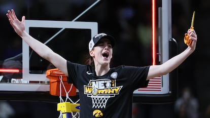 Caitlin Clark of the Iowa Hawkeyes cuts down the net after beating the LSU Tigers 94-87 in the Elite 8 round of the NCAA Women's Basketball Tournament at MVP Arena on April 01, 2024 in Albany, New York.