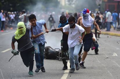 Protestas contra el Gobierno de Maduro, el domingo en Caracas. 