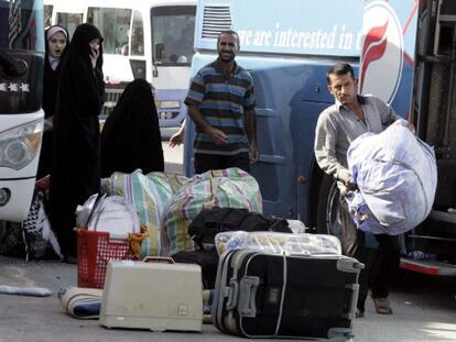 Una familia iraqu&iacute; que huye del conflicto en Siria llega a Bagdad.