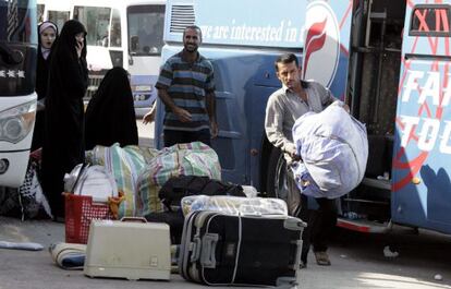 Una familia iraqu&iacute; que huye del conflicto en Siria llega a Bagdad.