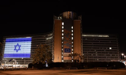 A handout photo made available by the European Commission showing a light projection of the Israeli flag on the Berlymont, the headquarters of the European Commission, in Brussels, Belgium, 08 October 2023