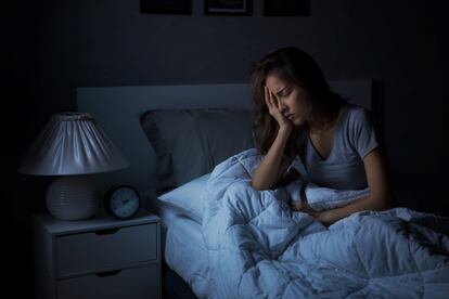 Una mujer con problemas de sueño.