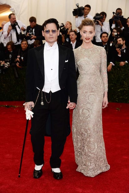 Jhonny Depp, de Ralph Lauren y Amber Heard, de Giambattista Valli.