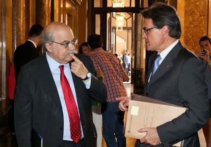 El consejero de Economía, Andreu Mas-Colell, junto al presidente de la Generalitat, Artur Mas, en 2013.