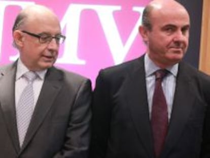 Los ministros de Hacienda y Econom&iacute;a, Crist&oacute;bal Montoro y Luis de Guindos.