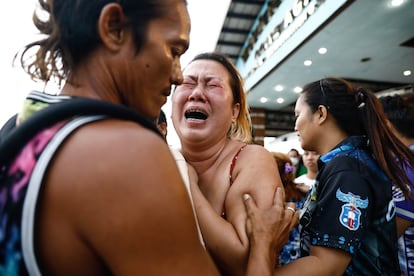 The relative of a victim mourns at the Binangonan port, after a passenger boat capsized off Binangonan, in Rizal province, Philippines, 27 July 2023.