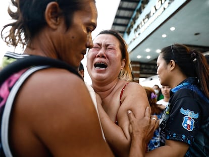 The relative of a victim mourns at the Binangonan port, after a passenger boat capsized off Binangonan, in Rizal province, Philippines, 27 July 2023.