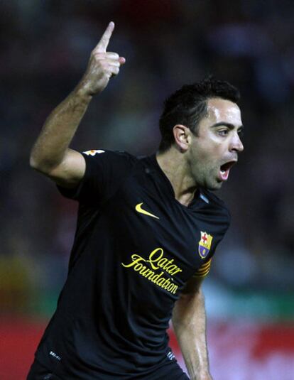 Xavi celebra su gol.