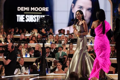 Demi Moore collects her Golden Globe for Best Actress in a Comedy or Musical on January 5, 2025 on stage in the ballroom of the Beverly Hilton Hotel in Beverly Hills, California. 