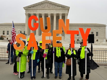 Supporters of gun control laws rally in front of the US Supreme Court as the justices hear the first major gun rights case since 2010, in Washington, U.S. December 2, 2019.