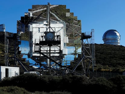 In the foreground is seen the Magic II telescope and on the right the largest telescope in the world GTC. The eruption of Spain?s Cumbre Vieja volcano is disrupting activity at the Roque de Los Muchachos observatory. On the Canary Island of La Palma, Spain. October 28, 2021. Picture taken October 28, 2021. REUTERS/Borja Suarez