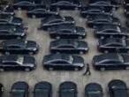 Cars are parked at the Great Hall of the People during the opening session of the 19th National Congress of the Communist Party of China in Beijing