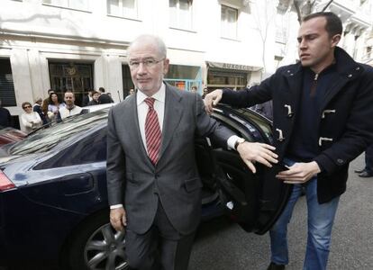 Former deputy prime minister Rodrigo Rato arrives at his office.