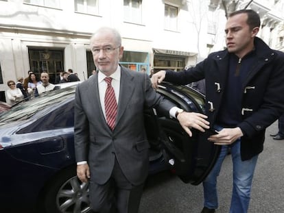 Former deputy prime minister Rodrigo Rato arrives at his office.