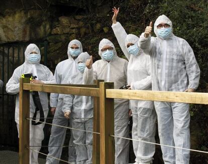 Five lucky visitors to the Altamira cave, selected at random.