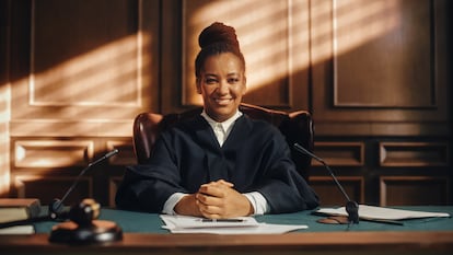 Cinematic Court of Law Trial: Portrait of Impartial Smiling Female Judge Looking at Camera. Wise, Incorruptible, Fair Justice Doing Her Job Professionally, Sentencing Criminals and Protecting Innocent