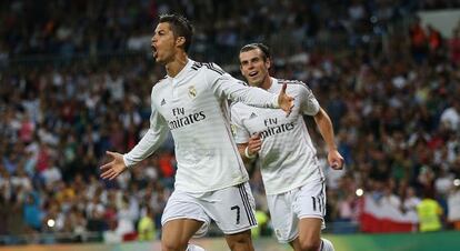 Cristiano celebra uno de sus cuatro goles al Elche