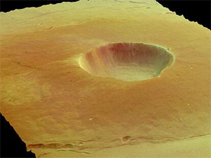 Fotografía en tres dimensiones de la caldera de Albor Tholus, un volcán en la zona Elysium. Tiene un diámetro de 30 kilómetros y una profundidad de 3 kilómetros.