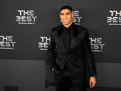 Moroccan player Achraf Hakimi poses on the green carpet before the ceremony of the Best FIFA Football Awards in Paris, France, Monday, Feb. 27, 2023.