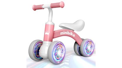 Outdoor games for babies 1 year old: mini size bicycle with large wheels.