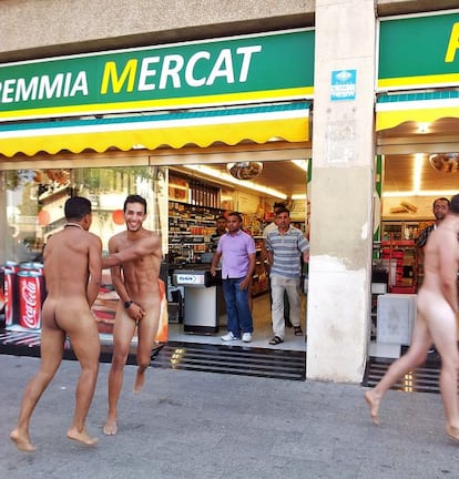 Three Italian tourists running around naked in Barceloneta on Friday.