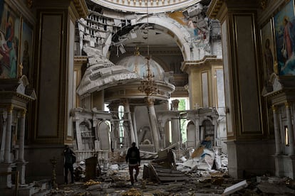 Church personnel inspect damages inside the Odesa Transfiguration Cathedral in Odesa, Ukraine, Sunday, July 23, 2023