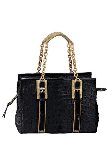 Longchamp te propone esta versión en negro con dorado. Su precio, 1.250 euros.