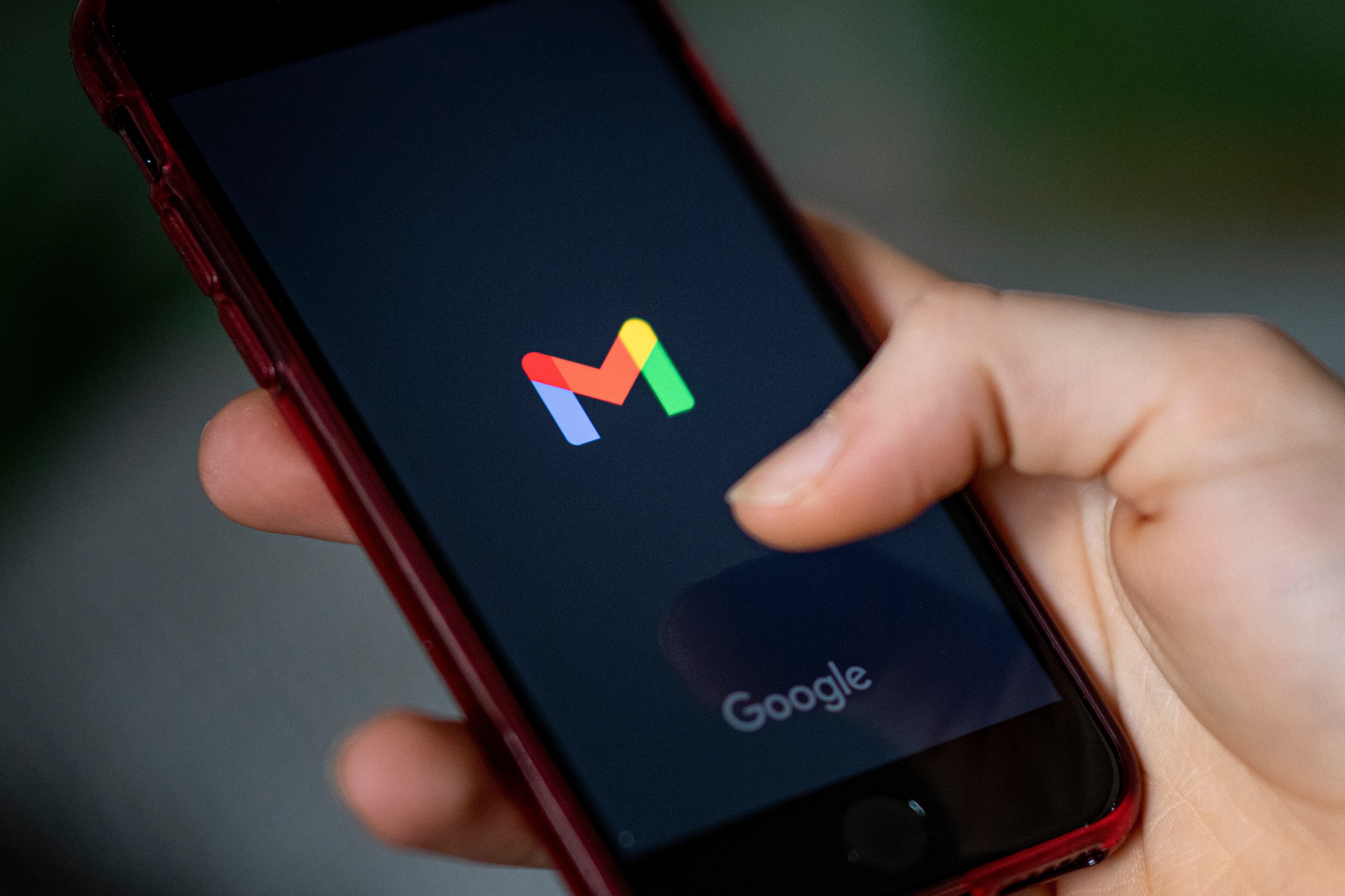 ILLUSTRATION - 24 April 2021, Berlin: The logo of the app Gmail is seen on the screen of a smartphone. Google parent Alphabet announces Q1 figures on 27/04/2021. Photo: Fabian Sommer/dpa (Photo by Fabian Sommer/picture alliance via Getty Images)