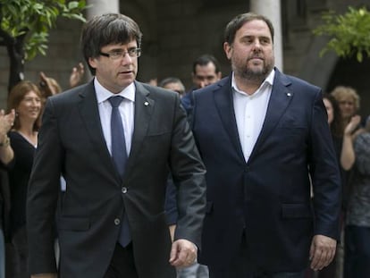 Carles Puigdemont, presidente de la Generalitat, y Oriol Junqueras, vicepresidente.