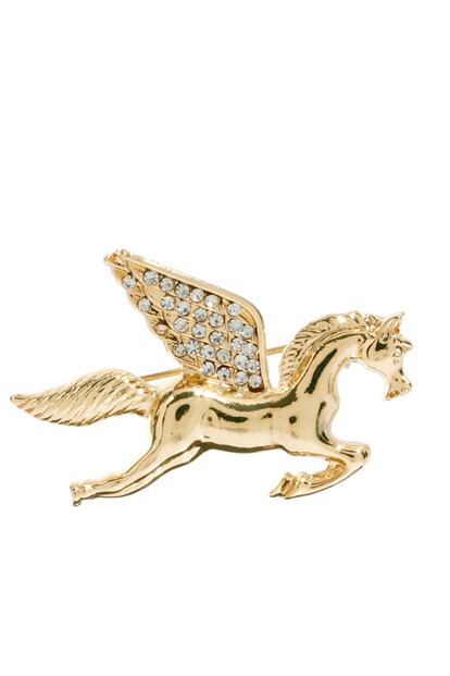 Broche dorado con pedrera, de Asos (15 euros).