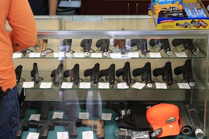 Handguns are displayed at a gun shop on June 23, 2022, in Honolulu.