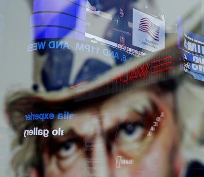 A jumbotron showing House Speaker Nancy Pelosi (D-CA) is reflected in the face of Uncle Sam during ABC's broadcast of her speaking to the U.S. House of Representatives during the session to discuss rules ahead of a vote on two articles of impeachment against U.S. President Donald Trump, at Times Square in New York City, New York, U.S., December 18, 2019.  REUTERS/Shannon Stapleton