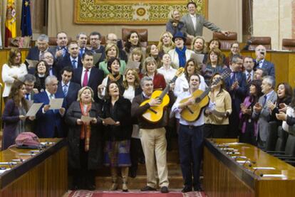 Los diputados cantan villancicos tras la votación de los presupuestos de 2011.