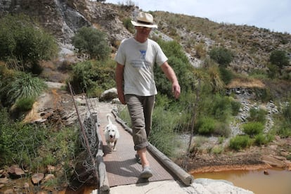 Chris Stewart crosses the makeshift bridge he built that separates his valley from civilization. This is the eighth attempt in 27 years, and took him two days to construct. “The river can turn into a raging torrent very quickly,” he says.